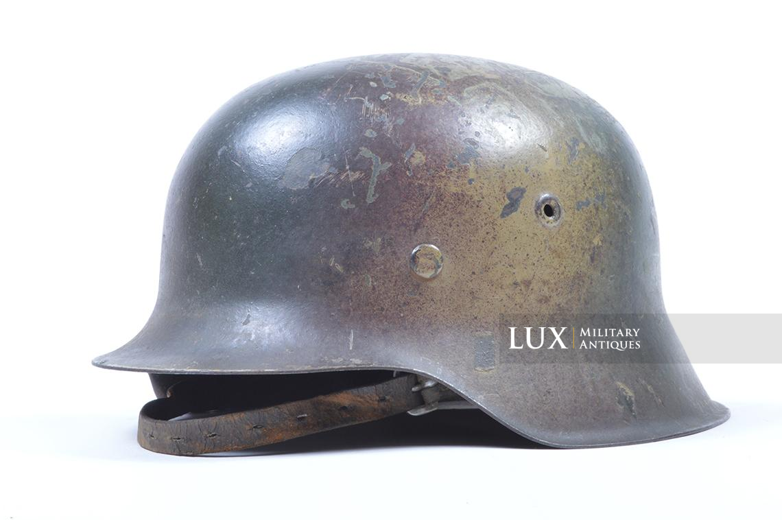 M42 Luftwaffe three-tone spray camouflage combat helmet with battle damage - photo 7