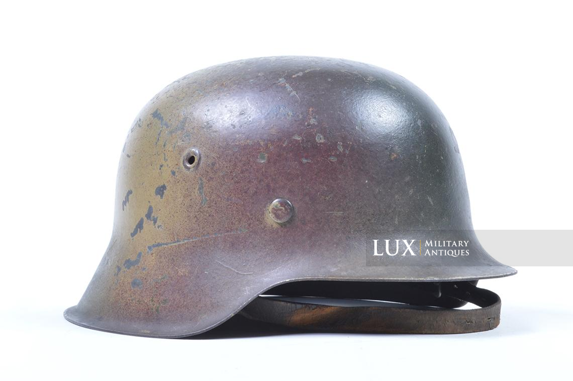 M42 Luftwaffe three-tone spray camouflage combat helmet with battle damage - photo 9