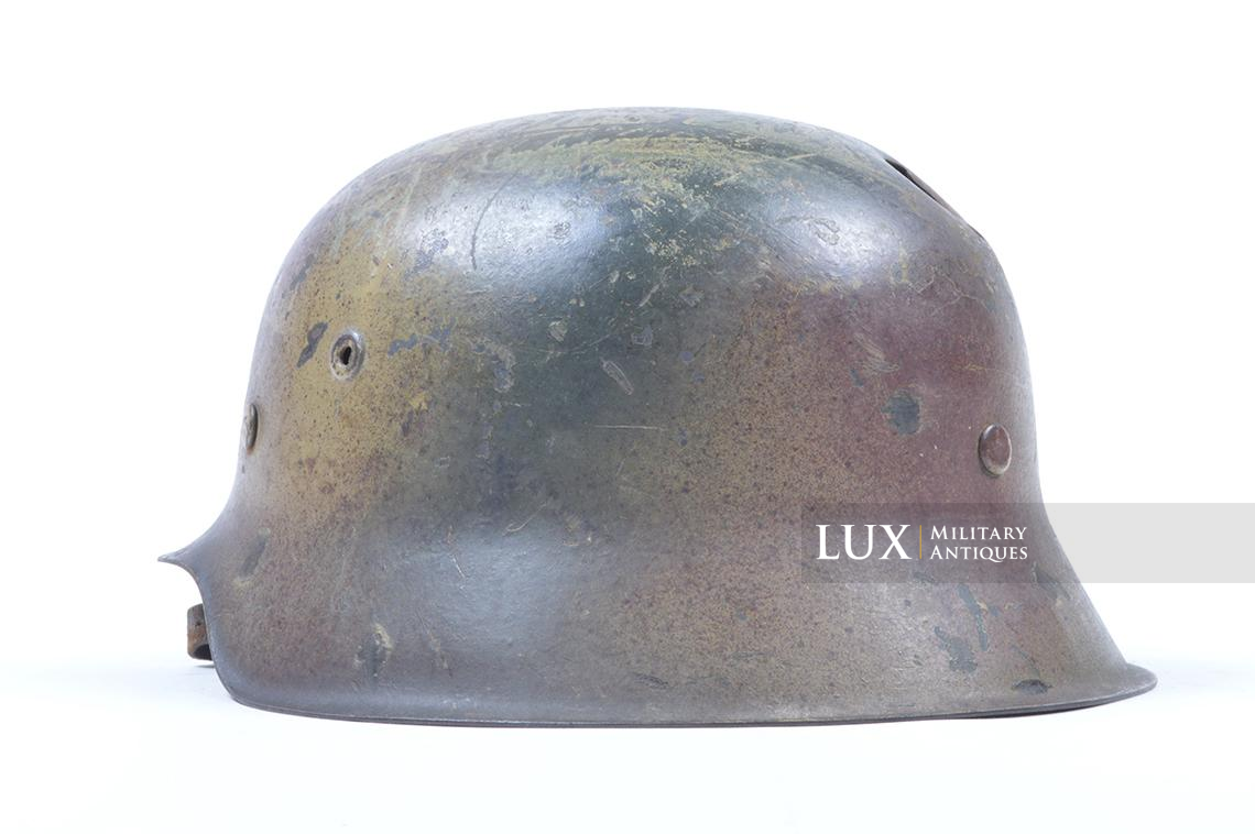 M42 Luftwaffe three-tone spray camouflage combat helmet with battle damage - photo 13
