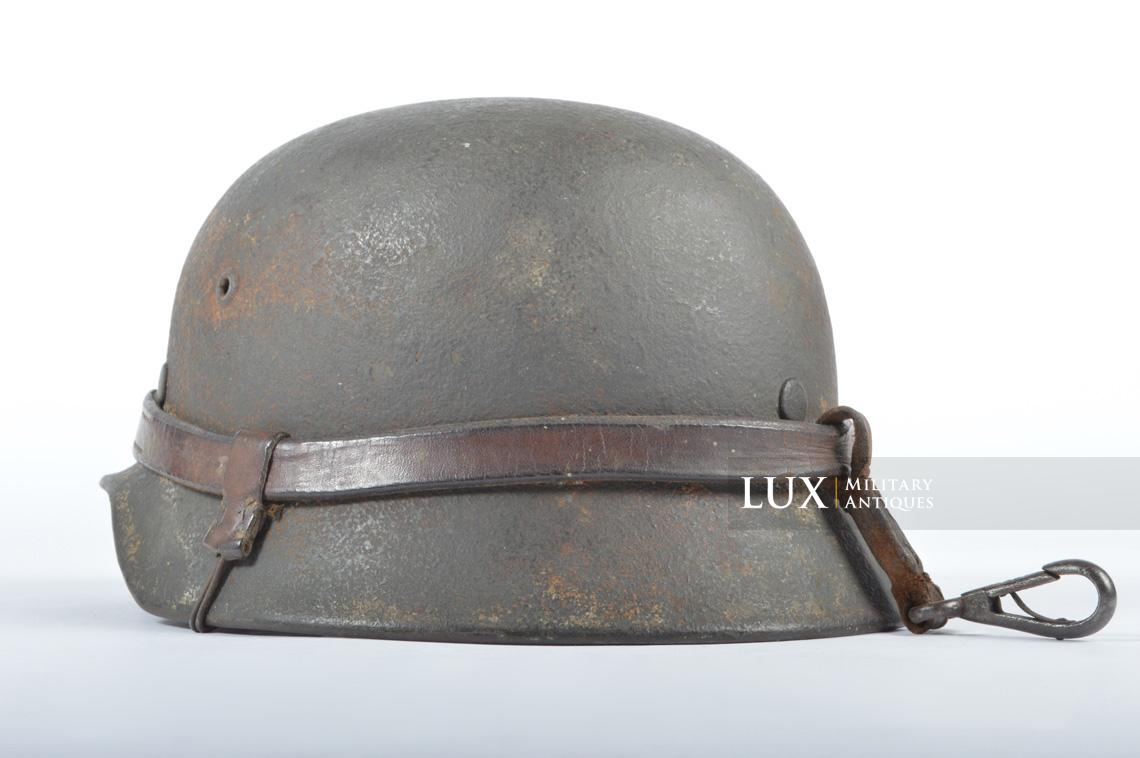 M35 Heer ex-winter camouflage combat helmet with leather carrier rig, « named » - photo 13