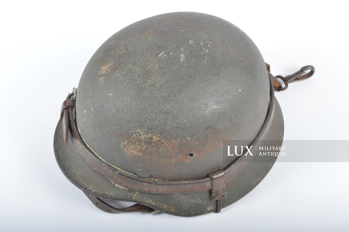M35 Heer ex-winter camouflage combat helmet with leather carrier rig, « named » - photo 14