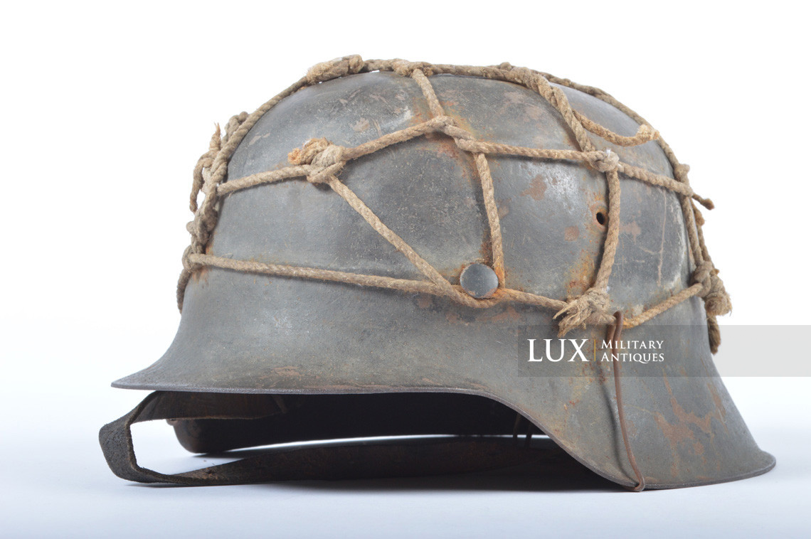 M42 netted German combat helmet, « ckl66 »