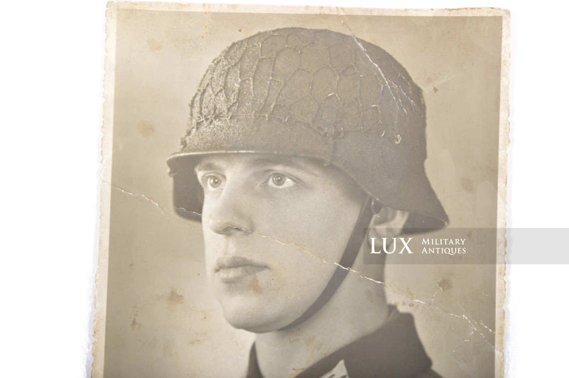 German period portrait of a soldier wearing a camouflage chicken wire helmet - photo 8